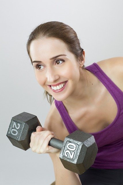 woman doing Weight training Exercise